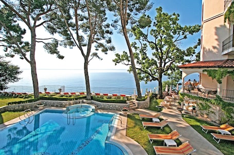 Indoor pool, outdoor pool, pool umbrellas, sun loungers