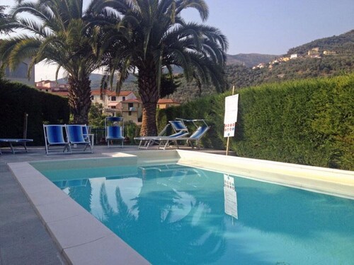 Part of a villa with pool.