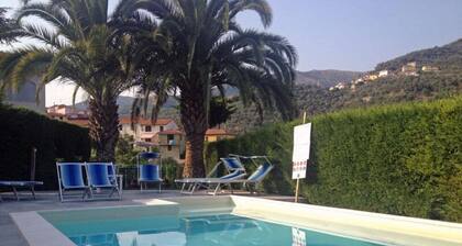 Part of a villa with pool.