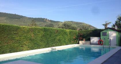 Part of a villa with pool.