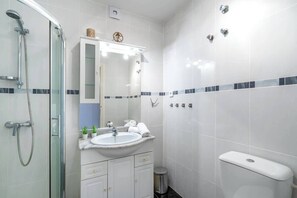 Shower, free toiletries, hair dryer, towels