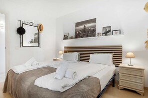 2 habitaciones, tabla de planchar con plancha y cuna de viaje 
