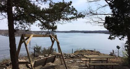 Located on a bluffcliff, 80 ft off the water with a magnificent view of the Lake
