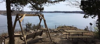 Located on a bluffcliff, 80 ft off the water with a magnificent view of the Lake