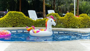 Outdoor pool, open 11:00 AM to 6:00 PM, pool umbrellas, pool loungers