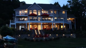 A large two-story house with multiple balconies and a covered patio area. - The Fun Spot 3 - Serene Home with Beautiful Lake & Mtn Views to Relax and Enjoy! (Huddleston)