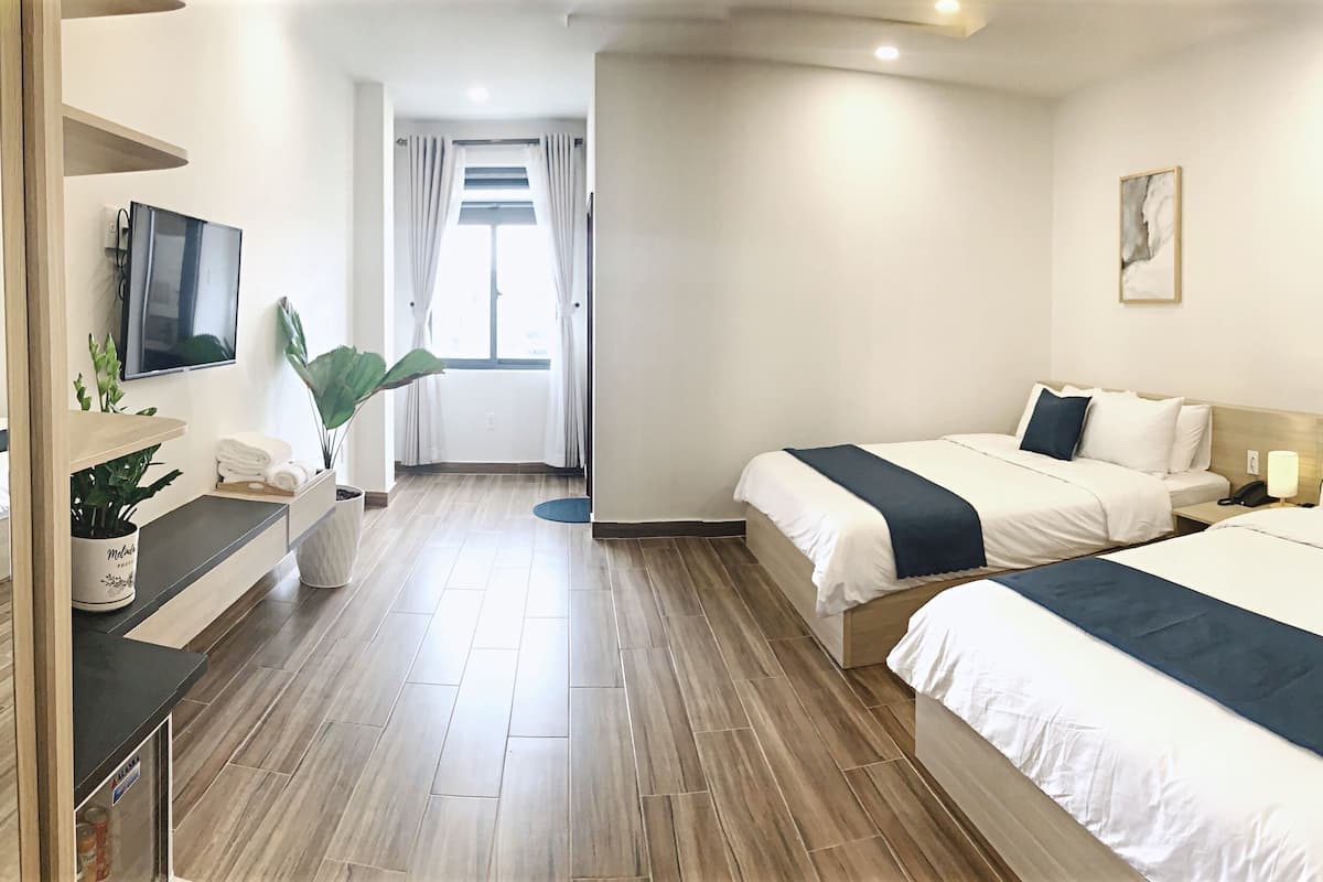 Phòng đôi Deluxe, không hút thuốc | Minibar, két bảo mật tại phòng, bàn 