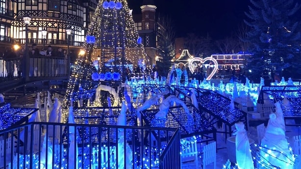 A large illuminated Christmas tree in a public square with surrounding festive decorations. - Sapporo Princess Hotel - Hostel (Sapporo)