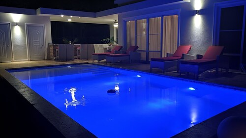 Modern & Private Tropical Villa in Gated Community Minutes From the Beach