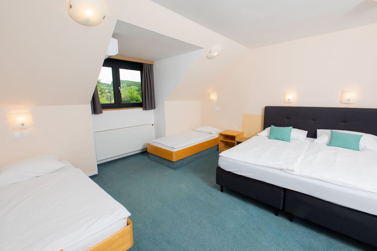 Comfort Quadruple Room, Multiple Beds, Non Smoking, Private Bathroom | Individually furnished, desk, laptop workspace, free WiFi