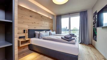 2 kamar tidur, seprai premium, dan selimut bulu angsa