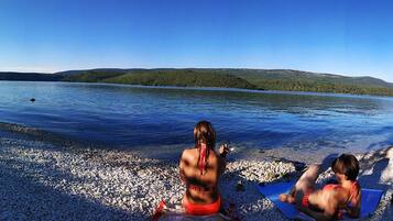 Beach nearby, sun loungers