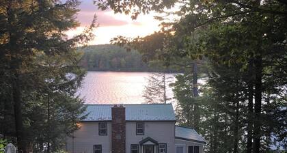 Spacious New Hampshire mountain waterfront get away house. Boats & private docks