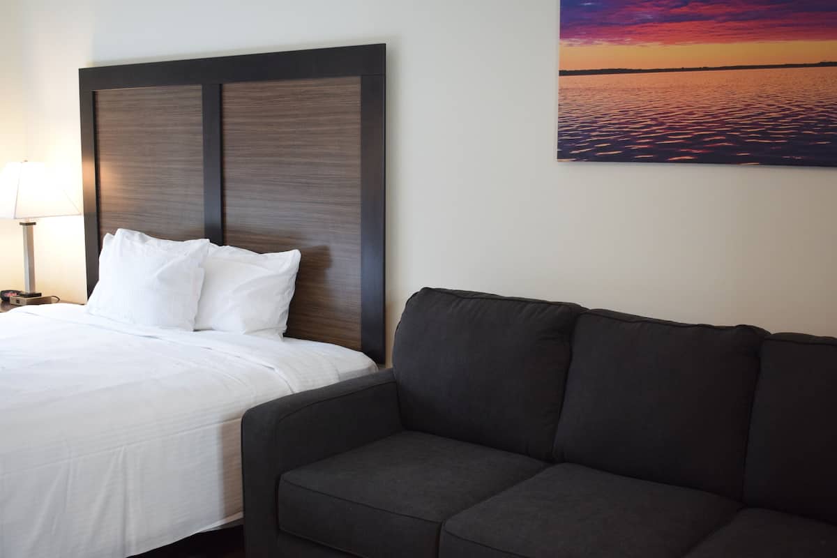 Executive kamer, 1 kingsize bed | Een bureau, een laptopwerkplek, gratis wifi, beddengoed