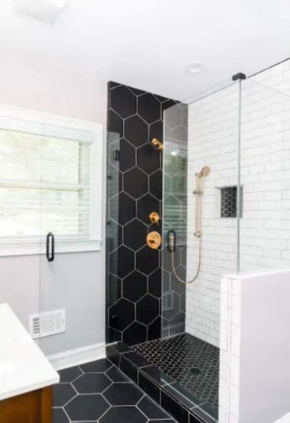 Combined shower/tub, hair dryer, towels, toilet paper