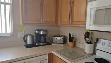 Villa | Private kitchen | Fridge, microwave, oven, stovetop