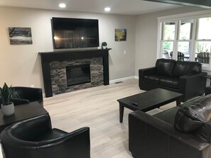 Smart TV, fireplace, ping pong