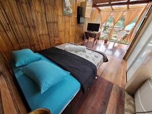 Suite estudio Signature, 1 cama de matrimonio grande | Edredones de plumas y decoración individual