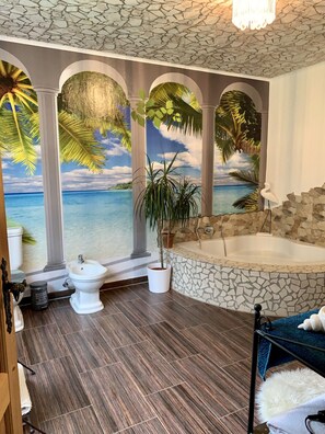 Bathtub, eco-friendly toiletries, hair dryer, bidet