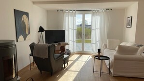 Smart-TV, peis og bøker