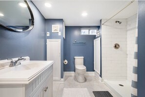 Shower, hair dryer, towels, soap