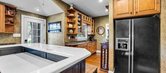 Waterfront home with 5 Acres! 4 bedrooms 3.5 bathrooms