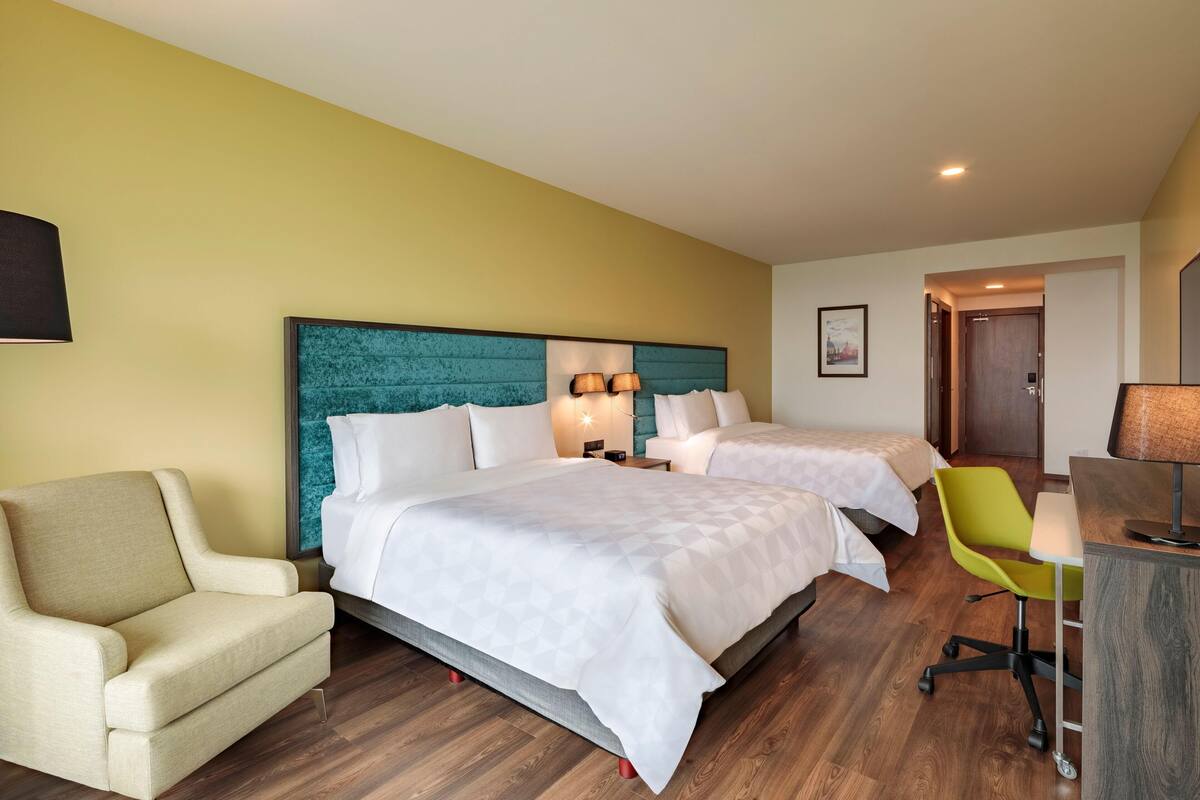 Premium bedding, down comforters, in-room safe, desk