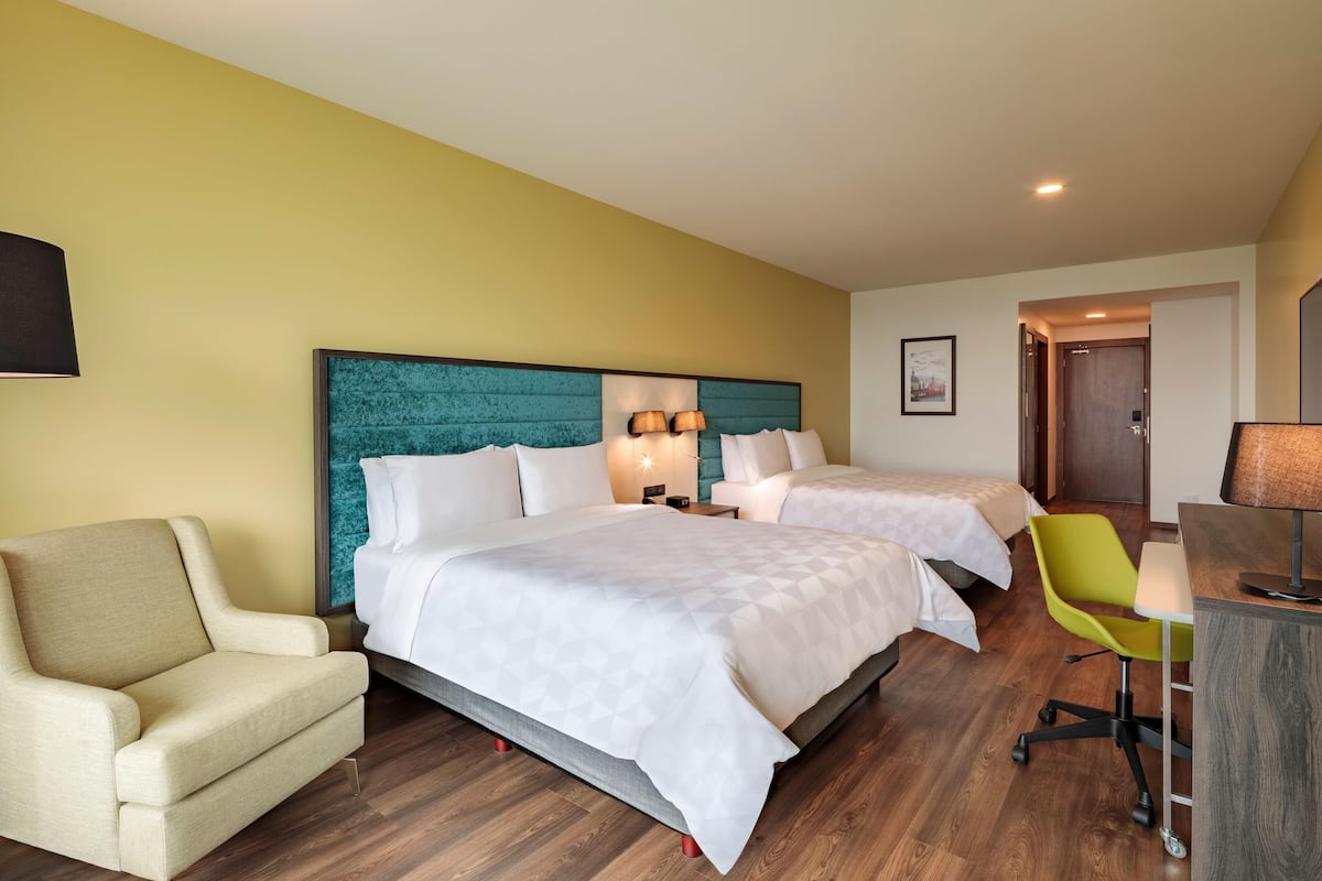 Premium bedding, down comforters, in-room safe, desk