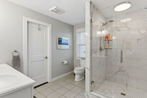 Bathtub, hair dryer, towels