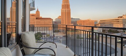 Sits Along the River Walk. 