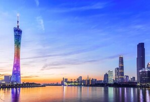 A city skyline with a prominent tower and several high-rise buildings. - City Comfort Inn Guangzhou Tiyu West Road Metro Station (Guangzhou)