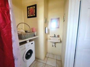 Hair dryer, towels, soap, shampoo