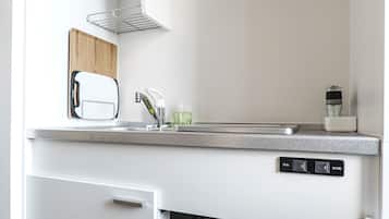 Mini-fridge, microwave, stovetop, cookware/dishes/utensils