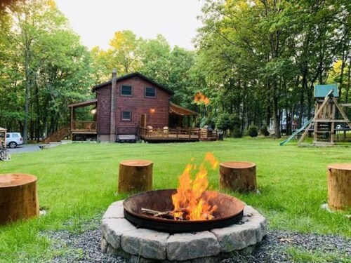 Beautiful wooden lodge cabin in the Heart of the Poconos. 