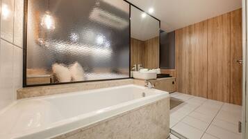 Deluxe Double Room | Bathroom | Shower, free toiletries, hair dryer, bathrobes