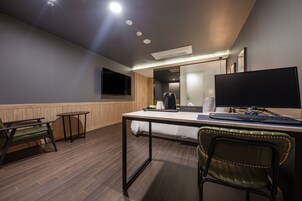 Deluxe Double Room | Down comforters, free minibar, individually furnished, desk