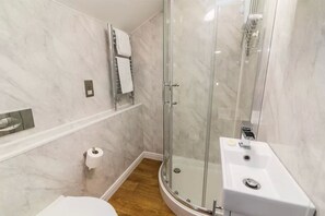 Shower, free toiletries, hair dryer, towels