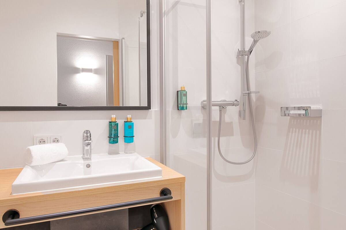 comfort single room, 1 single bed | bathroom | designer toiletries, hair dryer, towels, soap