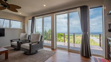 Villa, Non Smoking | Living area | Flat-screen TV