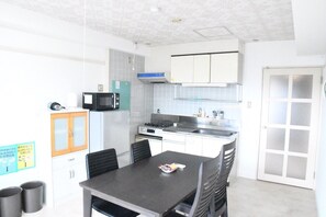 Fridge, microwave, stovetop, cookware/dishes/utensils