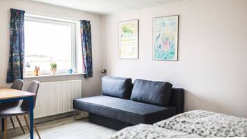 Estudio familiar, con acceso para personas discapacitadas, baño privado | Wifi gratis y ropa de cama