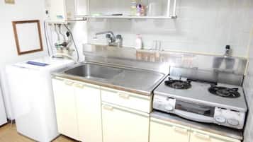 Fridge, microwave, stovetop, cookware/dishes/utensils