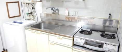 Fridge, microwave, stovetop, cookware/dishes/utensils