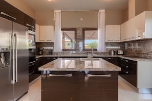 Fridge, oven, dishwasher, coffee/tea maker