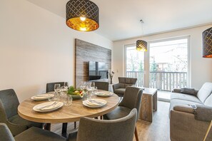 Comfort-Apartment, 2 Bedrooms | Living area | Flat-screen TV, heated floors - Haus Bergblick (Bad Hofgastein)