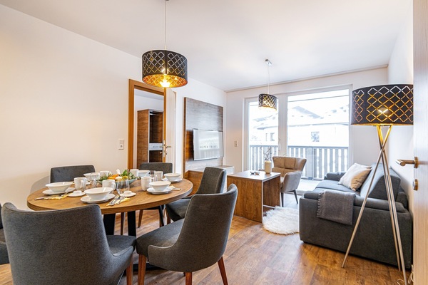 Apartment, 2 Bedrooms Penthouse | Living area | Flat-screen TV, heated floors