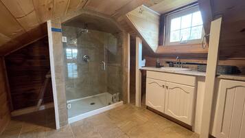 Shower, hair dryer, towels, soap