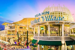 A multi-level shopping mall with a prominent sign reading 'HUA HIN Market Village.' - Oyo 688 Bangkok Hub Hostel (Bangkok)