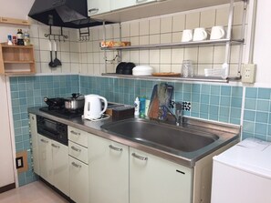 Fridge, microwave, stovetop, cookware/dishes/utensils