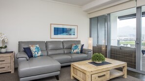 Superior Studio | Living area | TV - Magnetic Blue Waterfront Apartments (Nelly Bay)